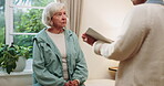 Checkup, old woman or physiotherapist in office with clipboard, assessment or injury feedback in exam. Discussion, elderly person or specialist with notes, evaluation or rehabilitation in retirement
