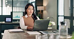 Corporate, woman and reading in office with laptop, research and metrics for finance report. Female person, typing and review in workplace with tech, financial audit and statistics for company profit