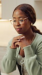 Remote work, glasses or black woman in home with laptop, proofreading or novel edit in creative process. WFH, eyewear or author with tech, reading manuscript or chapter planning in story development.