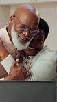 Success, laptop or senior couple in home with hug, savings growth or excitement in finance management. Happy, digital or black people with embrace, budget achievement or good news on retirement fund.