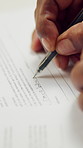Hands, person and writing on document with contract, legal application and estate settlement. Title deed, paperwork and consent with letter for asset protection, inheritance beneficiary and testament