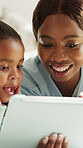 Happy mom, online and child with tablet in house, bonding and watching movies with app subscription. Family, love and black woman with daughter, smile and streaming cartoons with technology in home
