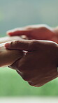 Care, comfort and couple holding hands outdoor together for commitment, empathy or support. Love, relationship and sympathy with person consoling partner in backyard for security, trust or wellness