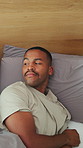 Sleeping, rest and black couple in bed at house with disappointment, upset or argument in morning. Tired, cuddle and man with woman in bedroom for fatigue, mad or exhaustion in home on weekend.