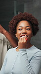 Woman, brushing teeth and couple in bathroom, clean and happy with partner in house or oral hygiene. Black people, grooming and bonding with spouse in home, morning routine and dental care for mouth