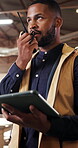 Industry, radio and tablet with black man in factory for manufacturing or production management. App, communication and quality control with person in storage warehouse for feedback or stock update