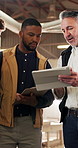 People, tablet and meeting in workshop for carpentry, project planning and design feedback. Manager, apprentice and tech in woodworking factory for compliance guidelines, advice and explain process