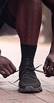 Fitness, start and hands outdoor with shoelace, ready and footwear safety in physical hobby. Secure, lace tie and man with sneaker, sportswear check and injury prevention in training preparation.