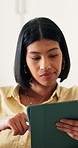 Freelancer, thinking and woman with tablet in lounge, graphic designer or brand identity on website. Remote work, reflection and person with tech for logo design, typography and assignment in house