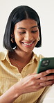 Laugh, texting and woman on couch with phone, digital communication and comic post on social media. Contact, typing and happy person in house with tech, funny message and meme reaction on chat app.