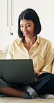 Creative, freelancer and happy woman with laptop in home, graphic designer or brand identity on web. Remote work, online and person with technology for logo design, typography and assignment in house