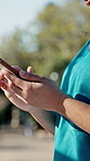 Nurse, scroll and hands with phone at park, student and preparing for exam with research on website. Outdoor, clinical trainee and person with mobile for chat, typing and checking medical test update