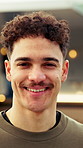 Student, face and man in city with laugh for travel, outing and explore outdoor on college break. Portrait, bokeh and happy person with smile for holiday, vacation and weekend for tourism or trip