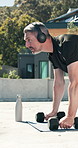 Weights, fitness and man outdoor for push up workout, muscle growth or body building in morning. Sports, equipment and mature person with dumbbells for arm exercise, wellness or active in backyard.