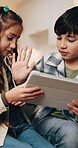 Children, tablet and high five for success on home sofa with internet connection, education or gaming app. Boy, girl and technology with siblings or family celebrate win, learning or sharing in house