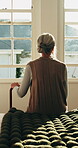 Thinking, back or old woman in home with walking stick, daydream or nostalgia in calm mindset. Reflection, window and elderly person with disability, flashback or peaceful perspective in retirement.