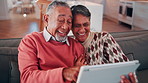 Senior, sofa and happy couple with tablet for funny joke, comedy or online entertainment in home. Elderly, man and woman with smile, laughing or technology for humor, network or subscription in house