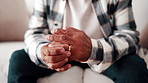 Hands, thinking and wedding ring with man in living room for regret, stress or frustrated. Anxiety, nervous and worry with mature person in house for divorce decision, marriage fail or pressure