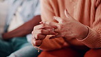 Couple, hands and woman with ring for regret, marriage mistake and doubt in relationship in home. Man, wife and fidget with jewelry for commitment crisis, separation anxiety and divorce with partner