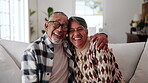 Laughing, face and senior couple in lounge, embrace and bonding with partner on weekend or affection. Portrait, elderly man and connection with mature woman, happiness and hug with spouse in house