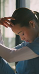 Sad, nurse and woman thinking of medical mistake in hospital, burnout and healthcare career. Stress, doubt and female person with depression or tired of surgery with worry, regret or fatigue