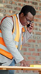 Architect, talking and black man with phone call on construction site for building or planning. Male person, civil engineer or contractor with smartphone for architecture, conversation or discussion