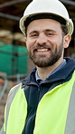 Face, architect and man at construction site with smile, urban development or remodeling. Portrait, happy person and employee for engineering, pride and infrastructure for safety and quality control