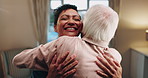 Happy, caregiver and hug in nursing home with old man, wellness and gratitude for medical support. Nurse, smile and embrace in retirement center with elderly person, trust or thankful for healthcare.