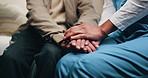 Elderly, man and holding hands in nursing home with caregiver, understanding and compassion for grief. Nurse, senior person and comfort in retirement center with support, kindness or console for loss