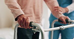 Physio, hands and old man in nursing home with walker, medical support and rehabilitation exercise. Physical therapist, help and senior person with disability, mobility aid and healing from stroke.