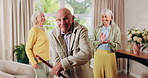 Senior, dancing or happy friends with cane in retirement house for fun holiday or summer break. Elderly group, people or smile with energy or movement for vibe or weekend celebration in old age home