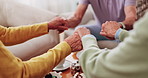 Elderly, people and holding hands with tea in home for faith, praying or gratitude for gathering. Senior, group or friends with unity, comfort or religion for retirement community, event or social
