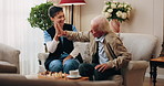 Caregiver, chess and old man in nursing home with high five, bonding together or happy for match winner. Nurse, senior person and celebration with board game, cognitive skills or retirement wellness.