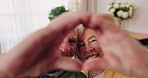 Senior, face or happy couple with heart hands for love, commitment or relationship together in home. Portrait, elderly man and woman with smile, like emoji or shape for romantic gesture in house