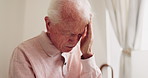 Senior, man and headache with stress in home for discomfort, fibromyalgia or mental health. Elderly, male person or pensioner with sore head or migraine for chronic illness or disease in house