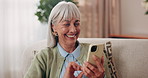 Phone, laugh and senior woman on sofa in home for funny meme, texting or social media joke. Happy, relax and elderly person with cellphone for reading comedy blog on mobile app in living room.