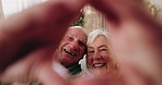 Elderly, face or happy couple with heart hands for love, commitment or relationship together in home. Portrait, senior man and woman with smile, like emoji or shape for romantic gesture in house