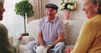 Friends, bonding and talk with old man in home to relax together, funny story or smile for gossip. Retirement, people and women at living room for conversation with happiness, laugh and socializing