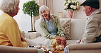 Friends, laugh and talk with old people in home to relax together, bonding or smile for gossip. Retirement, man and women at living room for conversation with happiness, funny story and socializing