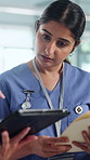 Talking, online and nurse on tablet in hospital for surgery schedule, planning and patient review. Healthcare, discussion and people with tech, paperwork and report for wellness and medical service