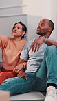 Couple, conversation and moving in new home with planning, opinion or explain interior design trend. Married, mature African people and relax in house with real estate, discussion or vision of decor.