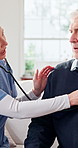 Stethoscope, caregiver and old man in home for healthcare, heart exam and breathing assessment. Nurse, person and cardiology test in living room, medical wellness and listening to lungs in retirement
