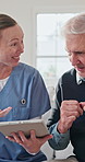 Nurse, old man and tablet for healthcare with fist pump, motivation or success in retirement home. App, celebration and medical results with caregiver speaking to senior patient for checkup or visit