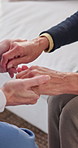 Nurse, holding hands and trust with senior person, assisted living and understanding at home. Comfort, caregiver or support with connection for kindness, healthcare or help with empathy in retirement