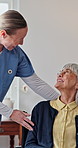 Wheelchair, nurse and checkup with old woman in home care, medical support and happiness. Smile, caregiver and person with disability, healthcare and laugh together with assisted living in retirement