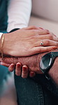 Nurse, empathy and holding hands with senior patient for understanding, trust or support in home. Healthcare worker, caregiver or sympathy with hope for elderly care or assisted living in house