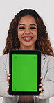 Green screen, face and tablet with business woman in studio for advertising, marketing or laugh. Brand awareness, digital tech and promotion with happy employee on white background for app campaign