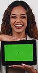 Green screen, face and tablet with woman for business advertising, marketing or laugh in studio. Brand awareness, digital tech and promotion with happy employee on white background for app campaign