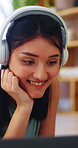 Fitness, headphones and laptop with woman on floor in home for video tutorial of yoga. Computer, smile and streaming with happy person in apartment for health activity, online class or wellness