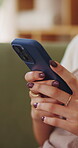 Hands, woman and texting with phone on sofa for dating app, message response and online connection. Social network, girl or mobile website in home with profile update, internet search or notification